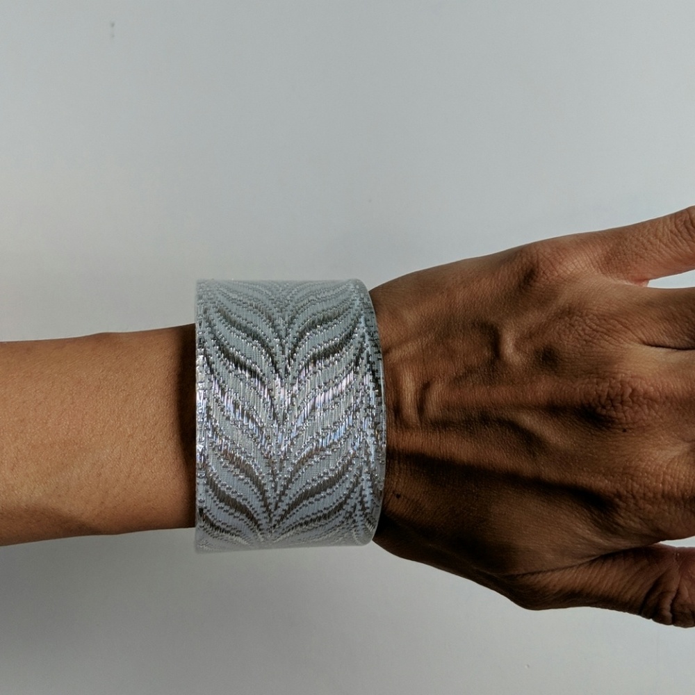 Silver patterned bracelet